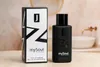 A black bottle of mySoul Homme fragrance and its packaging are displayed on a countertop in a bathroom setting. Náhľad obrázku produktu