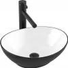 A black and white oval ceramic washbasin with a black faucet. Náhled obrázku produktu