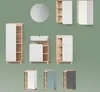 A collection of bathroom furniture items including cabinets and a sink, arranged against a plain green background. Produktbild-Vorschau
