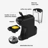 An exploded diagram of a black coffee machine with labels pointing out its different parts and features. Produktbild-Vorschau