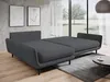 A modern living room with a grey sectional sofa that can be converted into a bed, placed on a wooden floor with a grey rug and a coffee table. Large windows offer a view of the outdoors. Produktbild-Vorschau