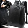 A person is holding a black backpack. Anteprima dell’immagine prodotto