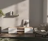 A modern living room scene with a TV lowboard, a shelf, and a chair. Produktbild-Vorschau