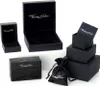A collection of black jewelry boxes and a pouch, all branded with the Thomas Sabo logo. Náhled obrázku produktu