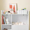 A white bookshelf filled with children's books, toys, and decorative items. Produktbild-Vorschau
