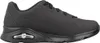 A side view of a black sneaker. Voir les images du produit
