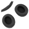 Three black headphone replacement parts are arranged on a white background. One is a curved headband cover, and the other two are circular ear pads. Podgląd zdjęcia produktu