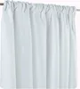 A white curtain with gathered pleats hanging from a rod. Produktbild-Vorschau