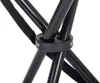 Close-up of the black metal frame and black fabric strap of a folding stool. Anteprima dell’immagine prodotto