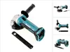 A cordless angle grinder with its accessories on a white background. Produktbild-Vorschau