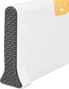 Close-up of a white rectangular object with a textured gray edge and a small yellow cartoon face on the top right. Produktbild-Vorschau