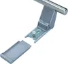 A close-up, angled shot of a metal and plastic handle mechanism, with one part detached. Produktbild-Vorschau