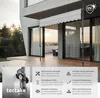 A white awning is extended over a wooden deck in front of a modern house with large glass doors. Náhled obrázku produktu