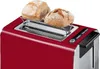 A close-up shot of a red toaster with two bread rolls on a warming rack. Produktbild-Vorschau