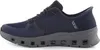 A side view of a single blue and gray Skechers slip-in sneaker against a white background. Voir les images du produit