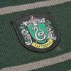 A close-up of a Slytherin patch on a green and gray striped fabric. Náhled obrázku produktu