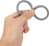 A hand holding a gray rubber ring shaped like an infinity symbol. Náhľad obrázku produktu