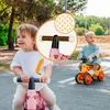 Two young children are riding on balance bikes outdoors on a paved path. Náhled obrázku produktu