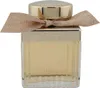 Chloé Absolu de Parfum Flakon aus geriffeltem Glas mit goldener Verschlusskappe und beiger Stoffschleife mit goldenen Akzenten. Podgląd zdjęcia produktu