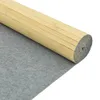 A rolled-up bamboo mat with a gray felt backing, shown on a white background. Podgląd zdjęcia produktu