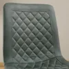 Close-up of the quilted backrest of a chair. Produktbild-Vorschau