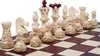 A close-up view of a chess set on a chessboard. Produktbild-Vorschau