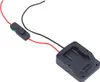 A black battery adapter with red and black wires and a switch, isolated on a white background. Produktbild-Vorschau