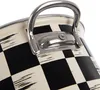 A close-up view of the handle and upper rim of a pot with a black and white checkered pattern. Produktbild-Vorschau