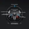 A close-up, angled view of a Logitech G29 Driving Force Racing Wheel for PlayStation, with various features highlighted by text annotations. Produktbild-Vorschau