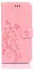 A pink phone case with a floral and butterfly design, shown flat against a white background. Produktbild-Vorschau