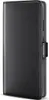 A black leather flip case for a smartphone, shown from the side. Produktbild-Vorschau