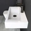 A modern bathroom sink and toilet. Produktbild-Vorschau