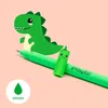 A green dinosaur illustration and a green pen with a cute cap. Náhľad obrázku produktu