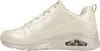 A side view of a beige Skechers sneaker. Voir les images du produit