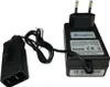 A black battery charger and its adapter are shown against a white background. Produktbild-Vorschau