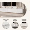 A modern white high-gloss TV lowboard with a television mounted above it, displayed in a luxurious living room setting. The image is divided into sections highlighting product features. Voir les images du produit