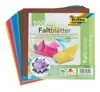 A stack of colorful origami paper sheets with the product packaging in the foreground. Voir les images du produit