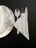 A place setting with a plate, napkin, and cutlery. Anteprima dell’immagine prodotto