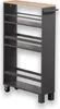 A dark gray narrow shelving unit with a wooden top, on wheels. Podgląd zdjęcia produktu