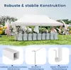 A white party tent set up outdoors with tables and chairs inside, decorated for an event. Produktbild-Vorschau