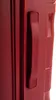 Close-up of a red suitcase handle and zipper. Podgląd zdjęcia produktu