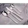 A set of cutlery laid out on a draped fabric. Produktbild-Vorschau