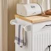 A kitchen cart with a bread box and a towel hanging from a towel rack. Podgląd zdjęcia produktu