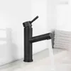 A black faucet with water running into a sink. Anteprima dell’immagine prodotto