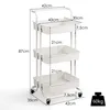 A white three-tier rolling cart with dimensions indicated by measurement lines and text. Voir les images du produit