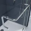 A close-up view of a modern shower enclosure, focusing on the chrome handle and glass panel. Produktbild-Vorschau