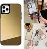 A collage of iPhone cases, some with a mirrored finish, and a lipstick.