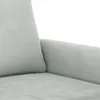 A close-up view of a light gray sofa armrest and cushion. Produktbild-Vorschau