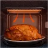 A roasted chicken is placed on a plate inside a microwave, with orange arrows indicating heat distribution from the heating element. Podgląd zdjęcia produktu