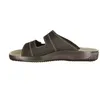 A side view of a black sandal on a white background. Anteprima dell’immagine prodotto